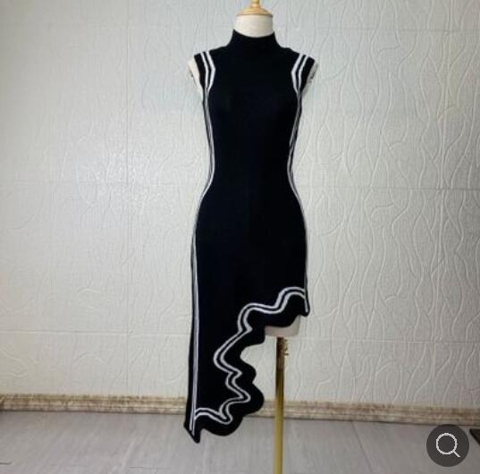 Asymmetrical Wavy Hem Round Collar Knit Midi Dress